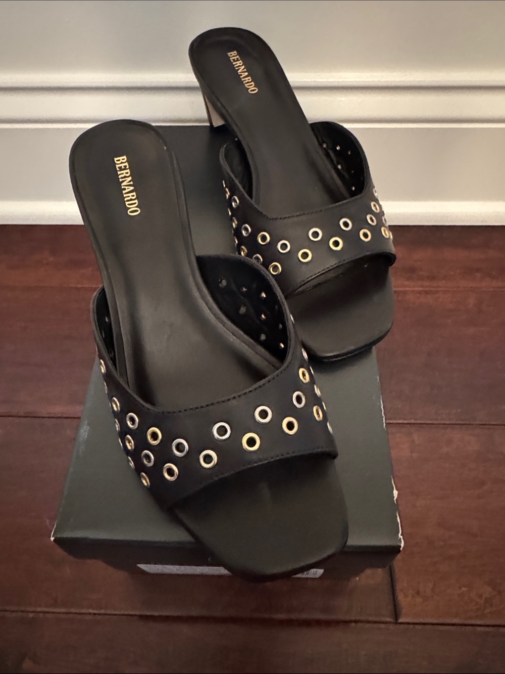 Bernardo Black Slide Mules with Gold & Silver Grommets